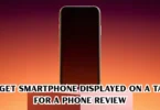 budget Phone Reviews displayed on a table for a phone review