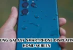 samsung phone reviews smartphone displaying its home screen